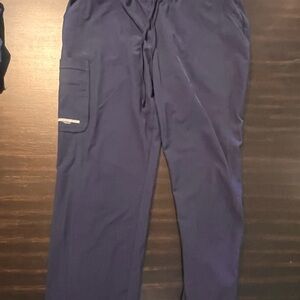 Women's navy blue cargo scrip pants by Sketchers.